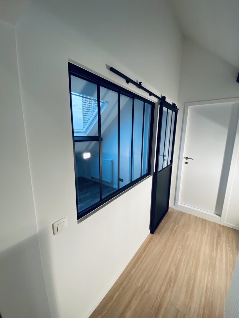 Aménagement et rénovation de grenier à Bruxelles – transformation des combles et isolation par Goldmann.EU